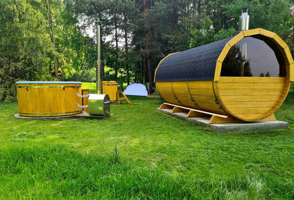 Sauna ogrodowa biberhaus fińska sucha mokra sauny ogrodowe zewnętrzne do ogrodu piec z piecem elektrycznym na drewno harvia huum drewniana biberhaus.com balia balie 96